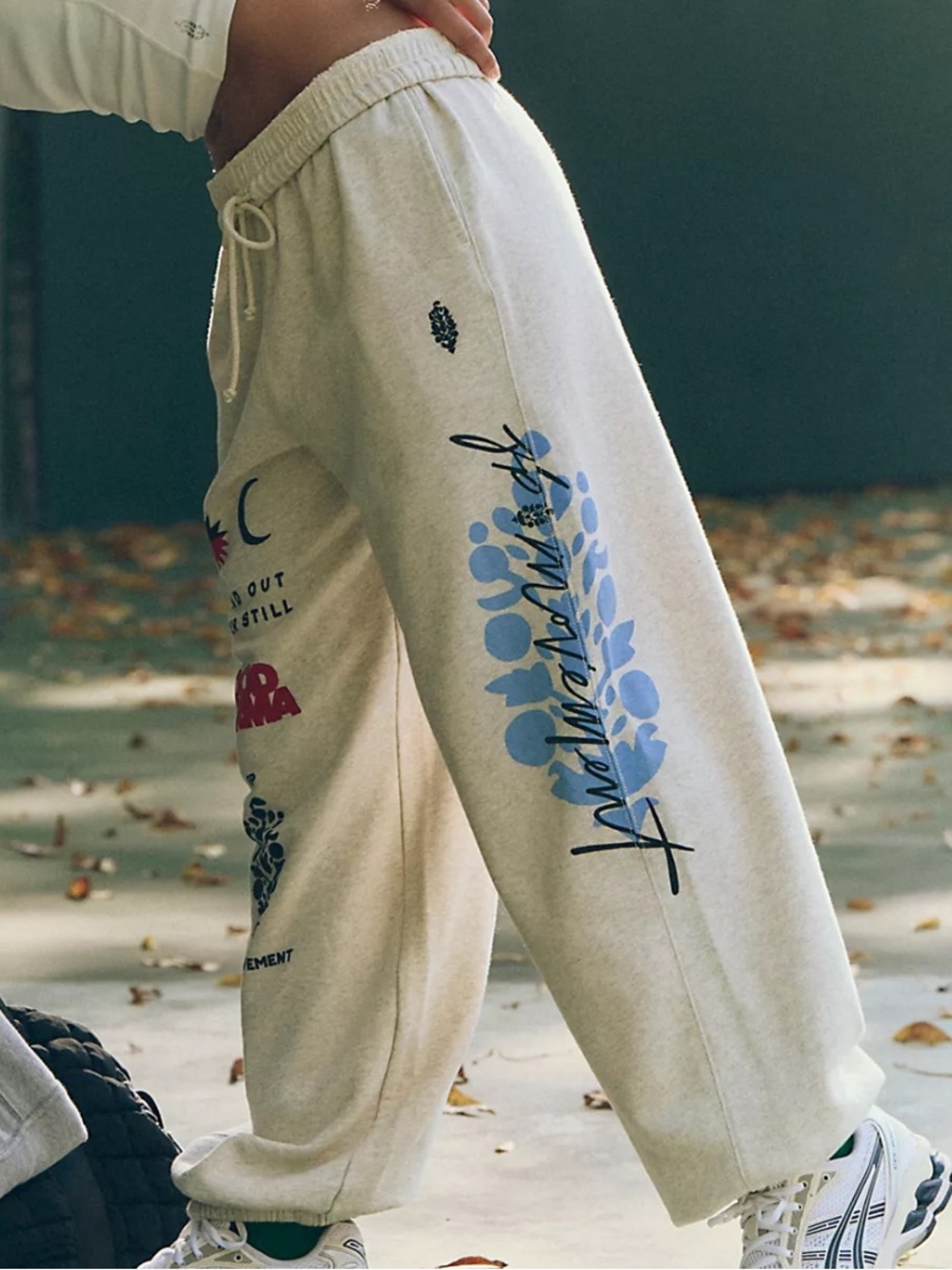 FREE PEOPLE MOVEMENT ALL STAR GRAPHIC PRINT PANTS in Blue and Red Combo